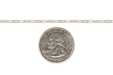 Two-tone gold-filled and sterling silver chain next to a U.S. quarter dollar coin for scale